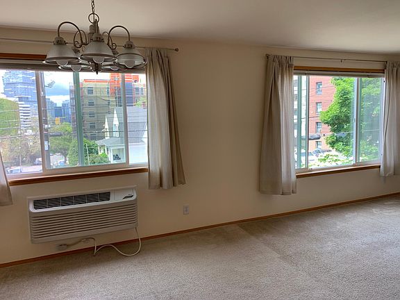 Large windows looking toward downtown Seattle. There's even a bit of a view of the Olympics. Great Sunsets!