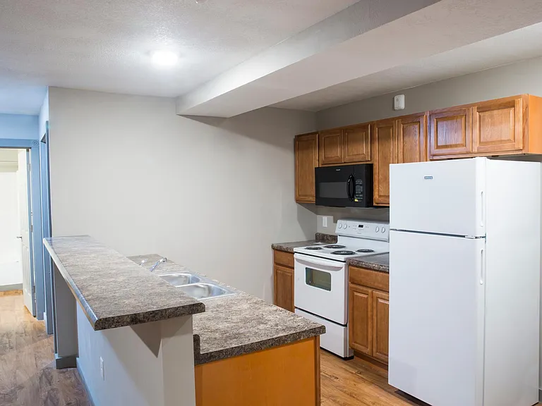 2 bedroom bar top and full kitchen with appliances.