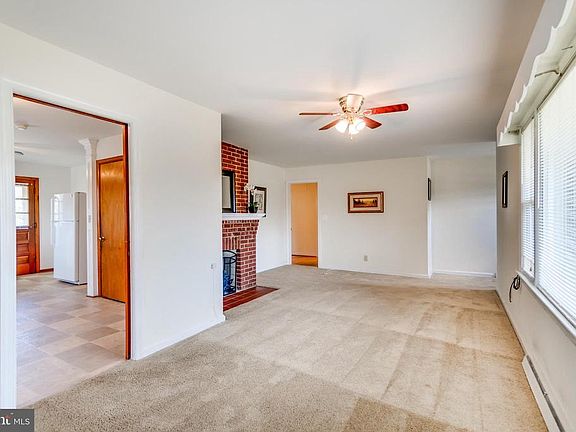 Family Room is located of the Kitchen