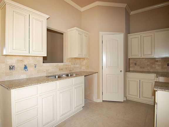 Kitchen with granite countertops