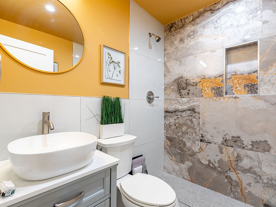 Porcelain wall-to-ceiling in bathroom
