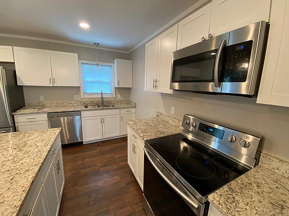 Stainless steel appliances French door refrigerator dishwasher disposal large center island