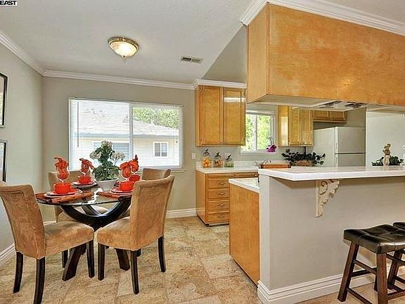 Kitchen & Dining Area (Before new flooring and paint)