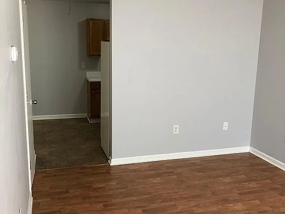 Half bath located right off living room and kitchen