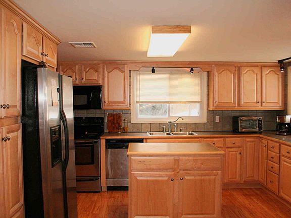 Custom cabinets, stainless steel appliances and plenty of storage.