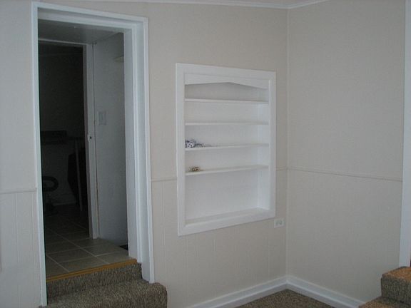 built in shelf in sunroom
