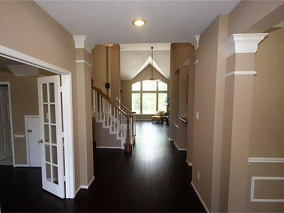 WOW! Notice the beautiful 5" hand scrapped hard wood floors