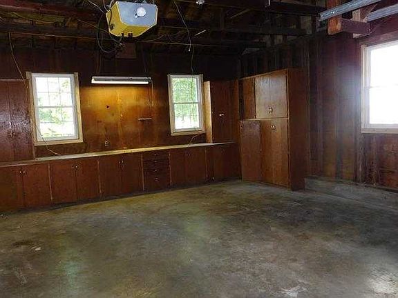 2 car garage with storage and work bench