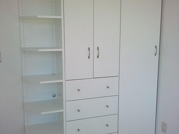 Closet unit in bedroom