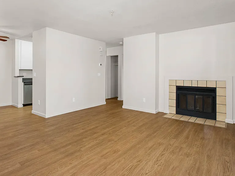 Living Room with Fireplace and Hard Surface Flooring