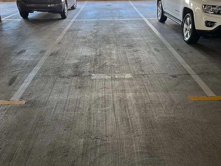 Tandem parking, 2 spots on the 5th floor of parking structure.