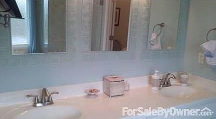 Sunroom
						:
						Sunroom features beautiful wood beam ceiling with 2 skylights & tile floors.