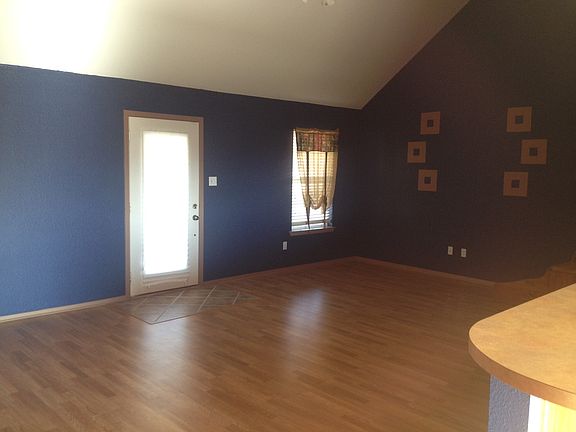 Living room w/ front door