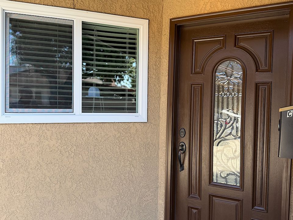 Private front entrance with dedicated mailbox.