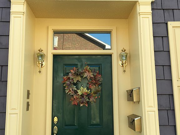 Main Entry with Intercoms (Left) and Maiboxes (Right)