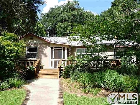 Well landscaped front lawn with easy maintenance plants.