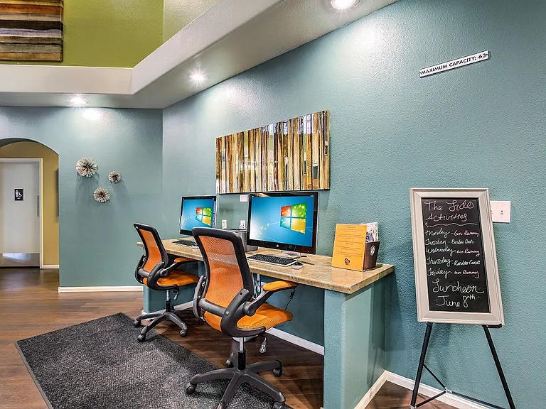 Resident business center with personal computers.
