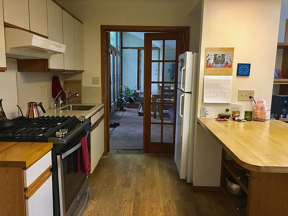 Kitchen looking into solarium.