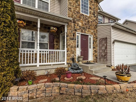 Beautifully landscaped yard and private porch