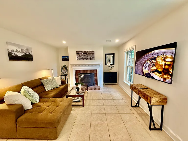 Studio with large pull out couch, coffee table, side table and lamps. Mounted brand new HD TV. Ample closet space.