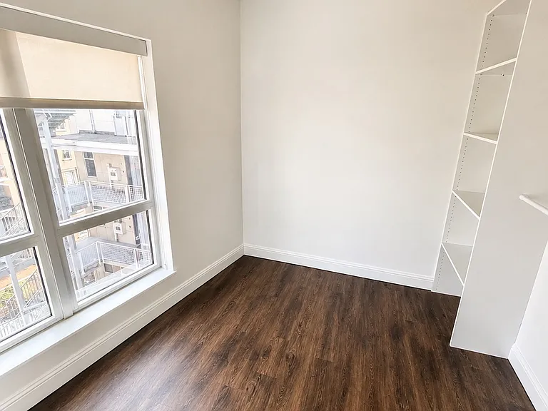 Walk-in closet with abundant storage and organization space.