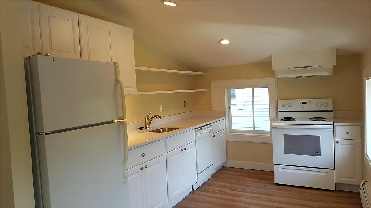 Photo 1 of 29 - 396 Orange St #3 - New Haven, CT Renovated kitchen with electric stove, range hood, dishwasher, garbage disposal and refrigerator. - 396 Orange St #3