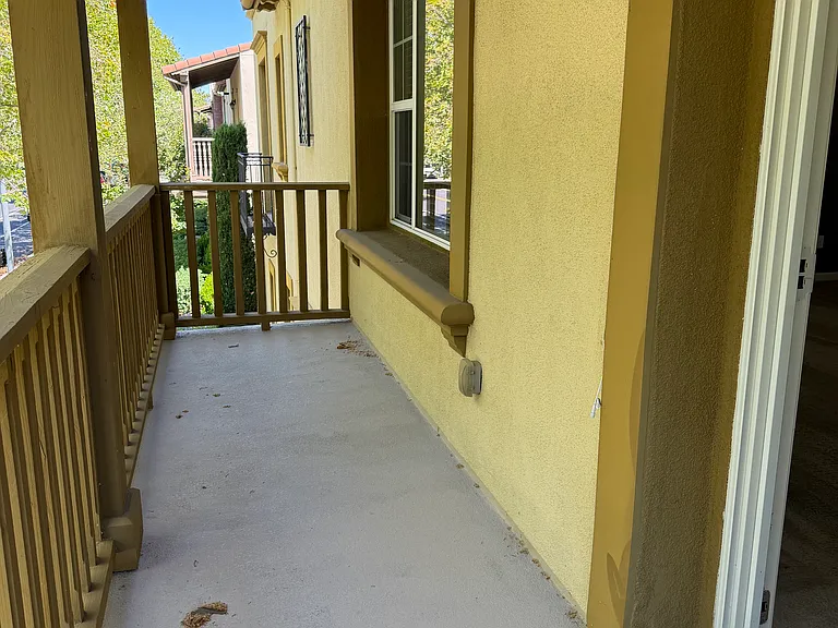 Balcony (facing the street - attached to master bedroom)