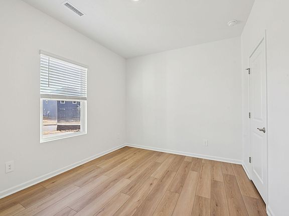 Secondary bedroom in the Sherwood floorplan at a Meritage Homes community in Raleigh, NC.