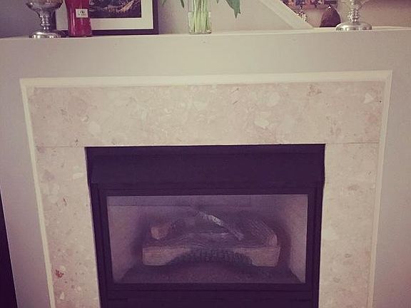 Gas fireplace with marble surround