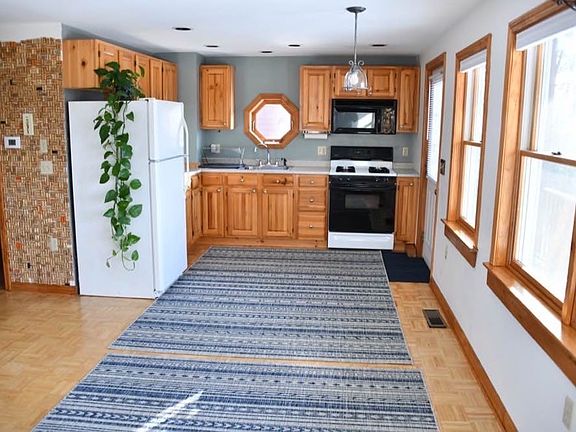 Open concept of living room and kitchen.