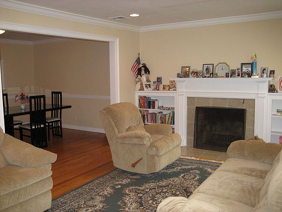 living room with marble fire place