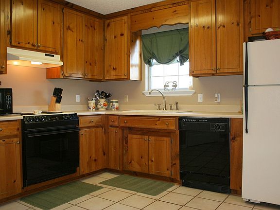 Kitchen with Plenty of Cabinets & Window at Sink