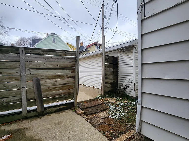 Back/side door view to back parking spots