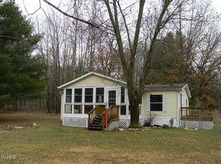 1030 Carmen Dr, Weidman, MI 48893