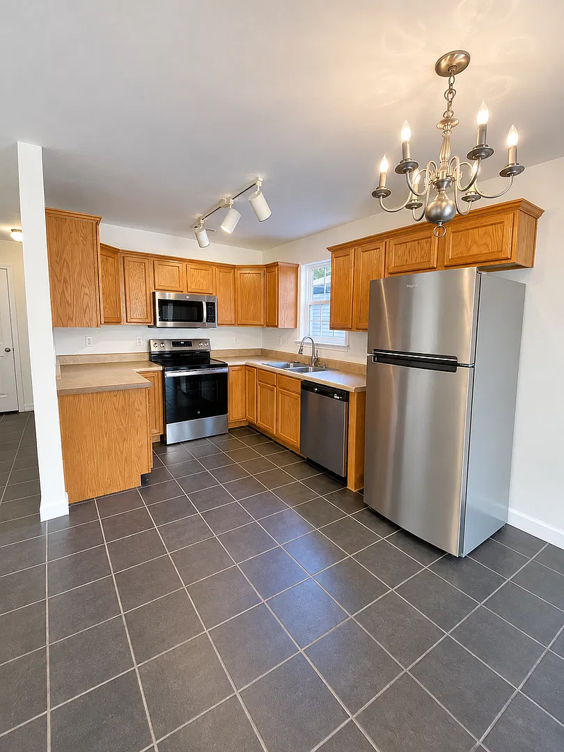 Spacious Living, Modern Comforts & Private Fenced Backyard! — Photo 3