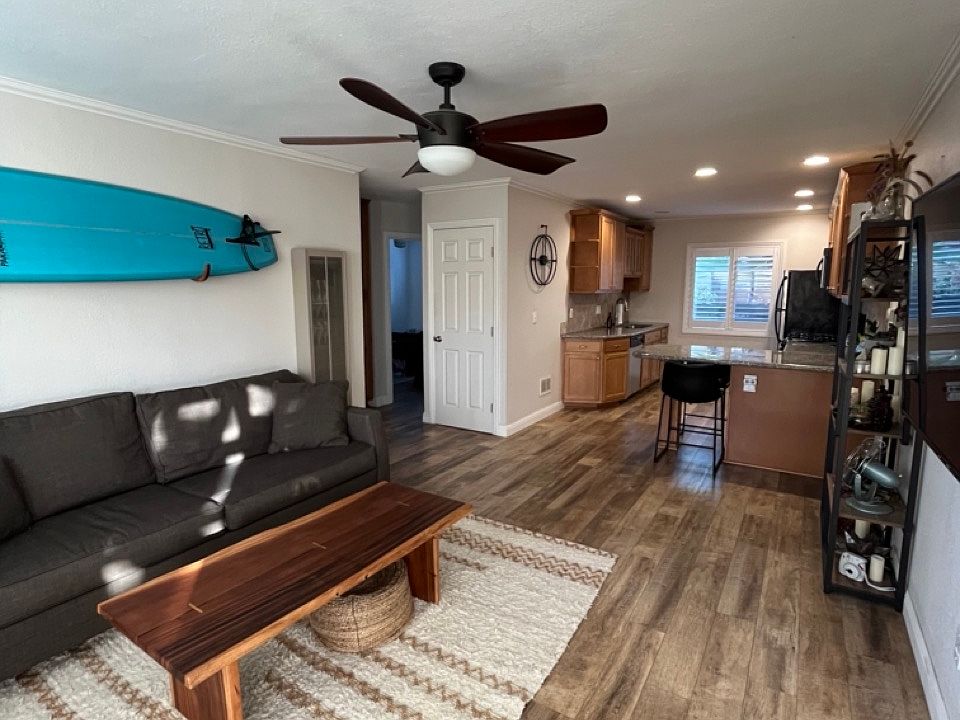 Living room and kitchen. Laundry in closet.