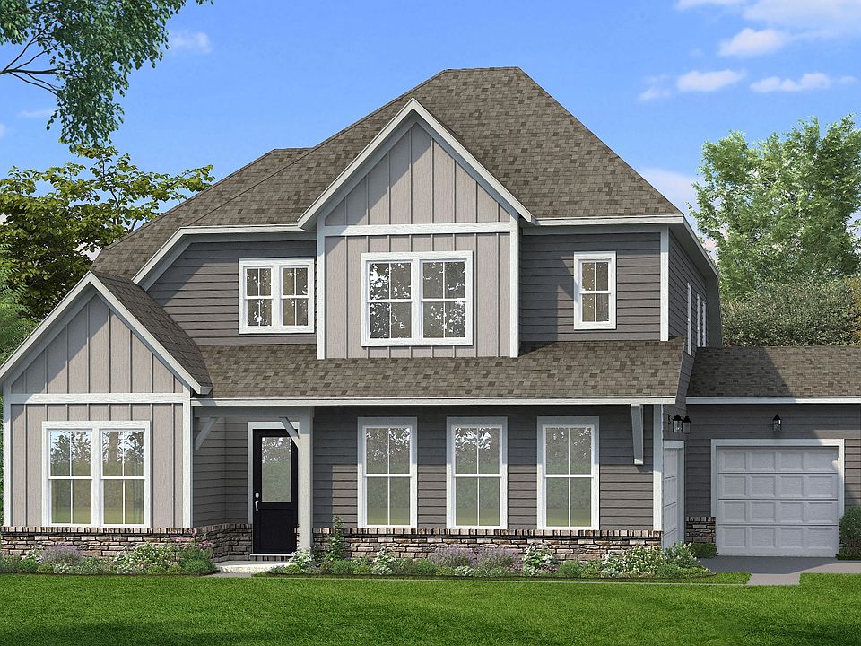 Laurent II Elevation with Side-Entry 3-car garage and brick water table