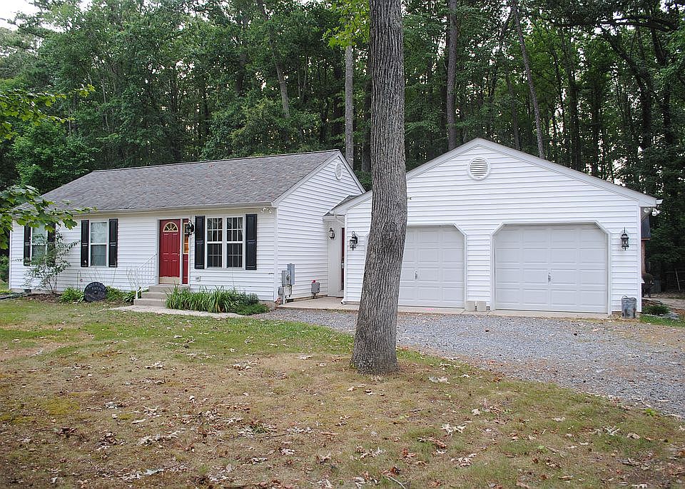 darling home. two car garage with mudroom.
