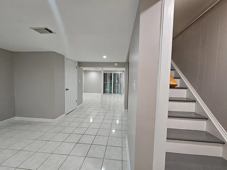 Full view of basement from stairwell