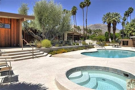 Pool, spa area with mountain views