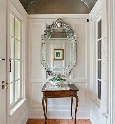 A barrel vaulted foyer greets visitors to the house.
