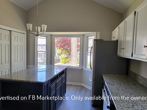 New light fixtures - huge island.