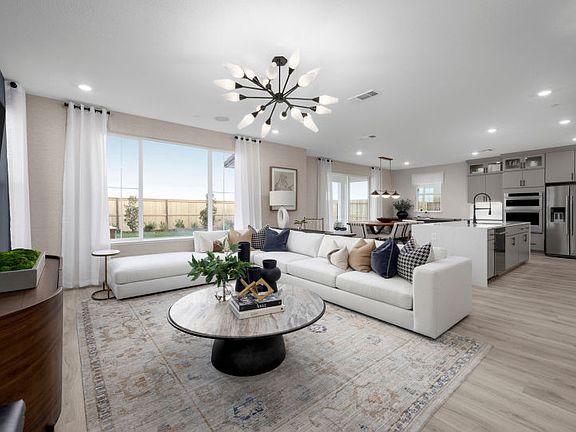 Gathering room open to kitchen and cafe area, perfect for entertaining