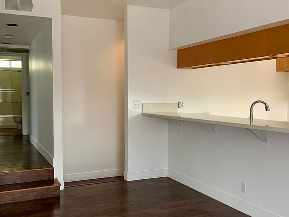 Entrance, hallway to bedrooms. Kitchen to the right side.