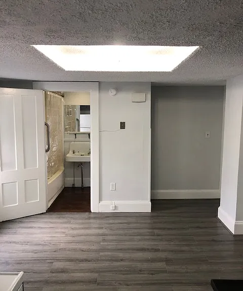 view from kitchen, bath and entrance