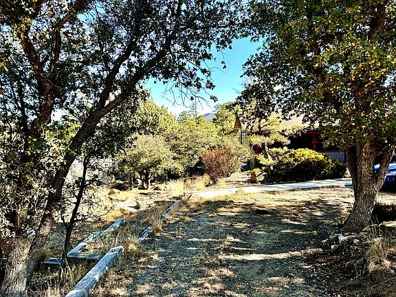 Circle driveway around house with plenty of parking for many cars