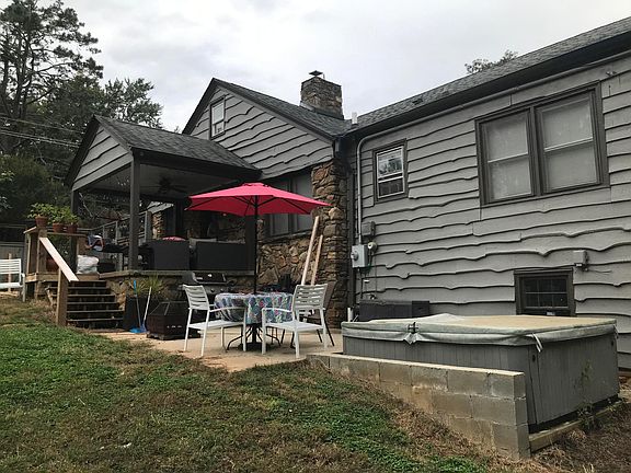Side yard, fenced in with patio.