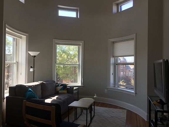 Living room in turret with expansive views
