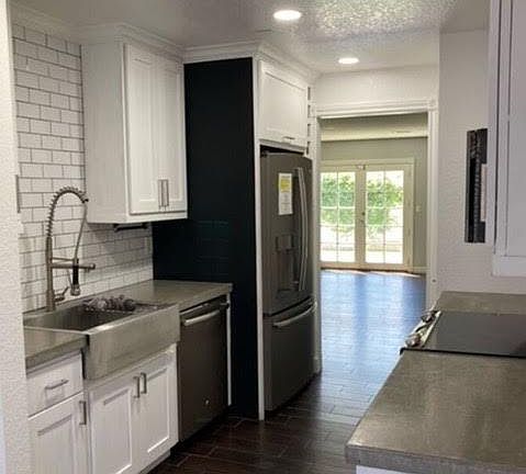 Kitchen with new appliances and cabinets