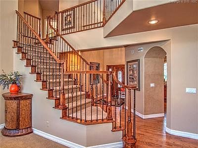 Another view of the elegant staircase taken from the great room...enter the kitc